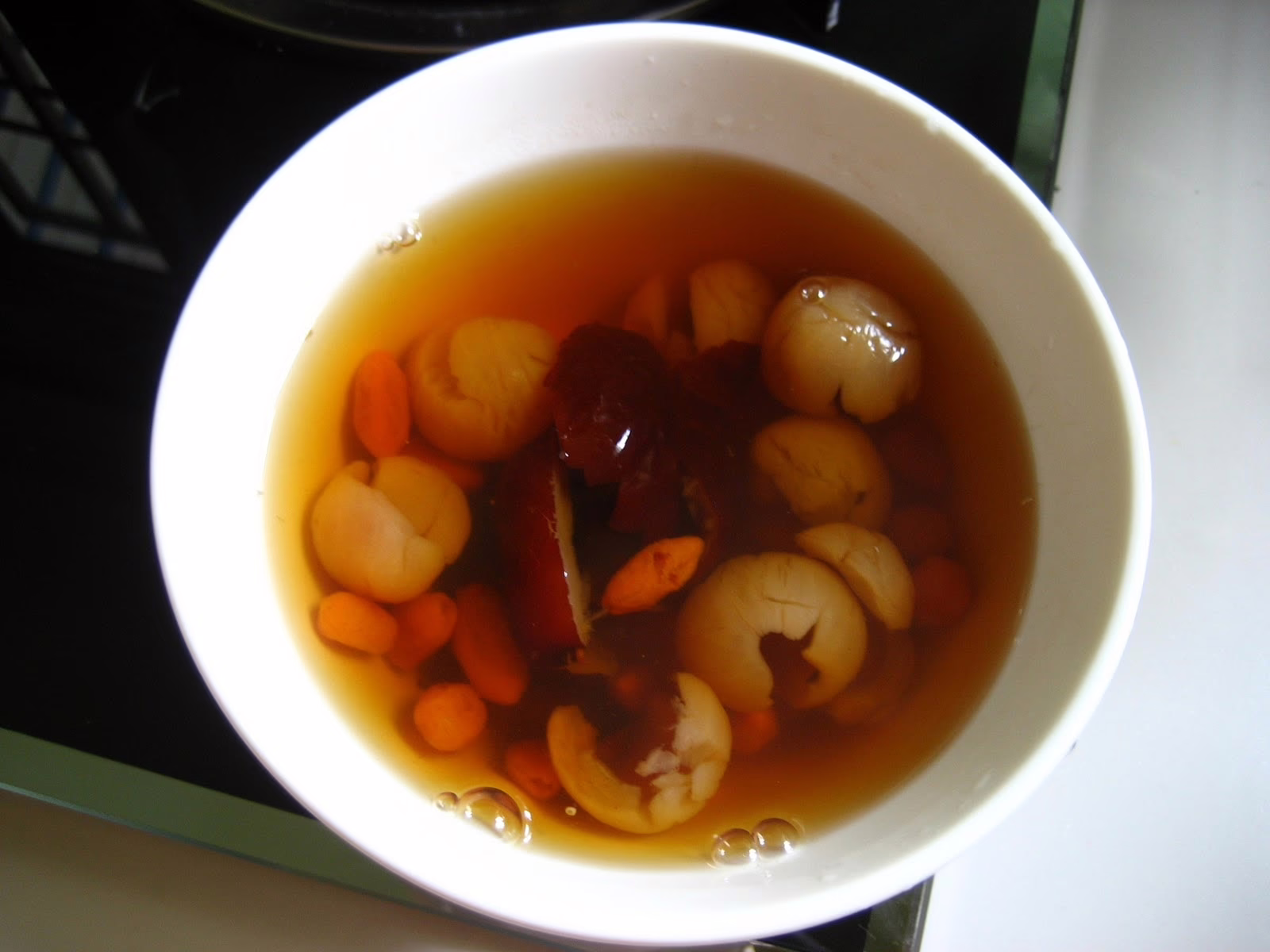 Warm red date and ginger tea for postpartum recovery during Chinese confinement (zuo yue zi)
