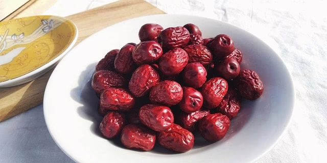 Dried red dates (jujubes) commonly added to Chinese postpartum soups and teas to support blood building and recovery